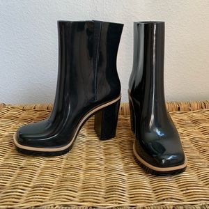 Sleek Black High Heeled Boots